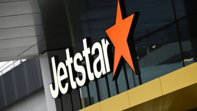 A boy with a loaded shotgun boarded a plane in Australia but was tackled by a former boxer
