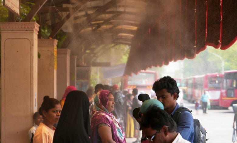 In one Indian city, reflective paint and bus stop sprinklers offer relief from killer heat In one Indian city, reflective paint and bus stop sprinklers offer relief from killer heat