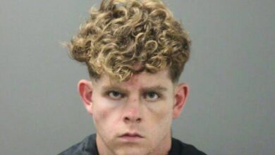 Teacher admits stabbing couple to death while hiking with their children in Arkansas, police say